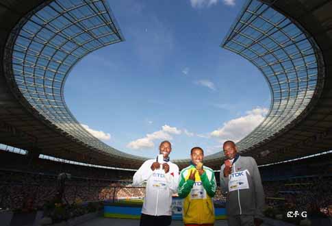 BERLIN: (L-R) Bernard Lagat of United States receives the silver medal, Kenenisa Bekele of Ethiopia the gold medal and James Kwalia C'Kurui of Qatar the bronze medal during the medal ceremony for the men's 5000 Metres Final during day nine of the 12th IAAF World Athletics Championships at the Olympic Stadium on August 23, 2009 in Berlin, Germany. BERLIN: (L-R) Bernard Lagat of United States receives the silver medal, Kenenisa Bekele of Ethiopia the gold medal and James Kwalia C'Kurui of Qatar the bronze medal during the medal ceremony for the men's 5000 Metres Final during day nine of the 12th IAAF World Athletics Championships at the Olympic Stadium on August 23, 2009 in Berlin, Germany.
